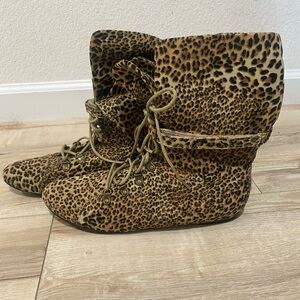 Leopard pattern high top felt boot.